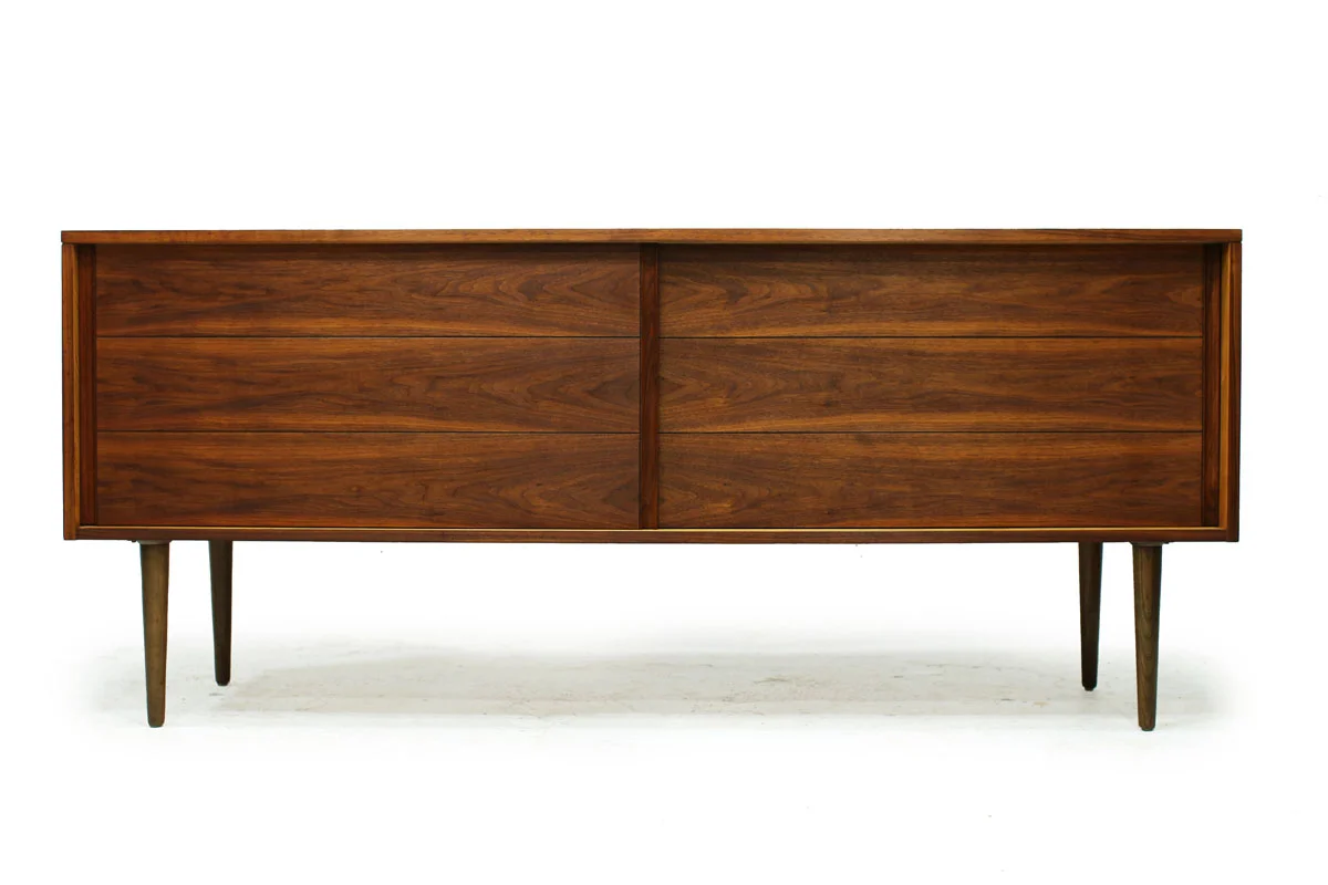 Sleek Walnut Mid Century Modern Wood Two Door Credenza with two drawers and tapered legs