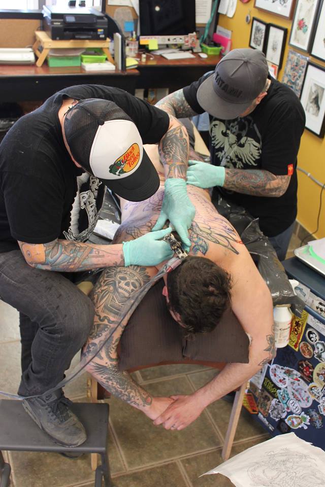 Shawn and Richard Tag Teaming Cody’s Back Piece