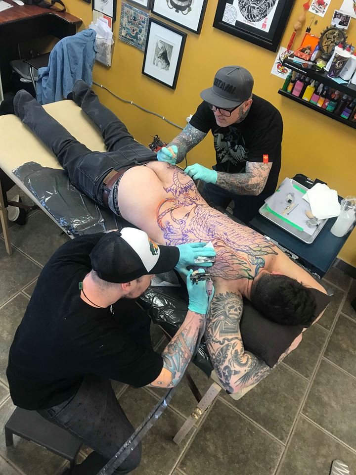 Shawn and Richard Tag Teaming Cody’s Back Piece