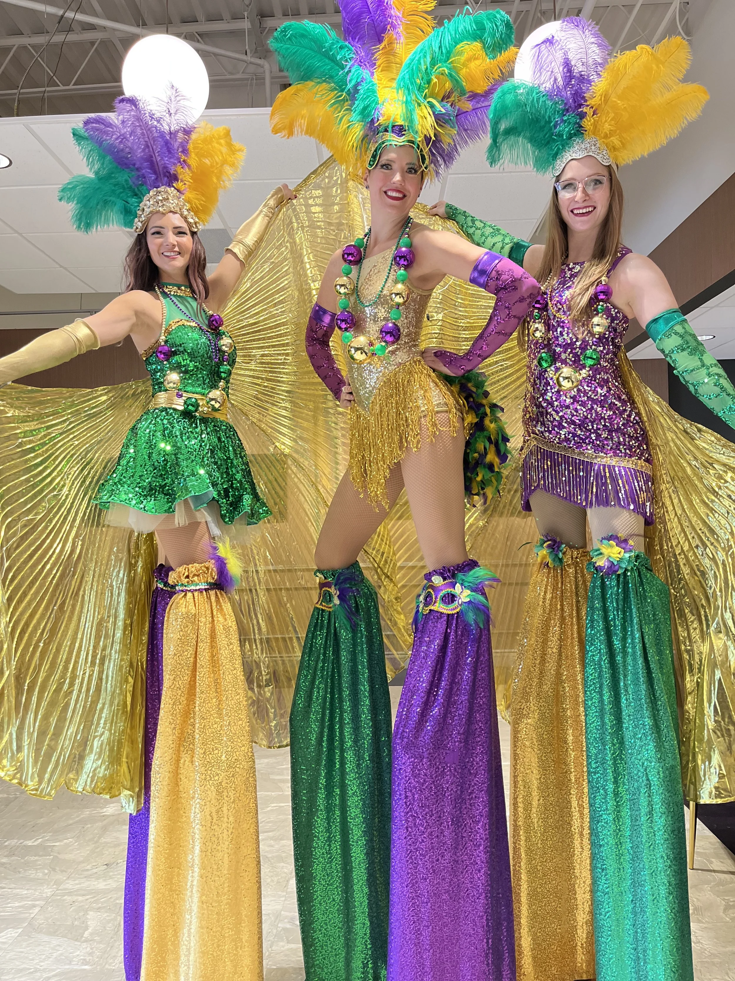 mardi gras stilt walkers entertainers entertainment luminary