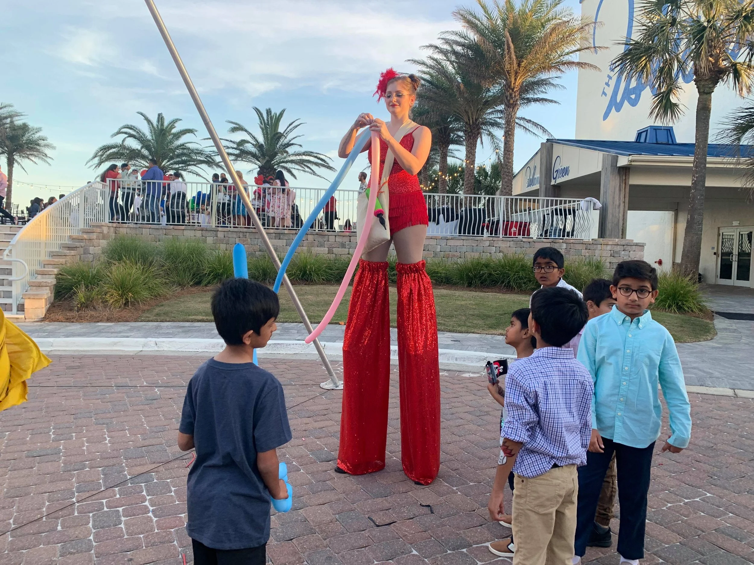 Destin Luminary Panama City Beach Rosemary Miramar Navarre Pensacola Balloon Twisting Entertainer Stilt Walker event entertainment Stilt Walking Entertainer luxury party