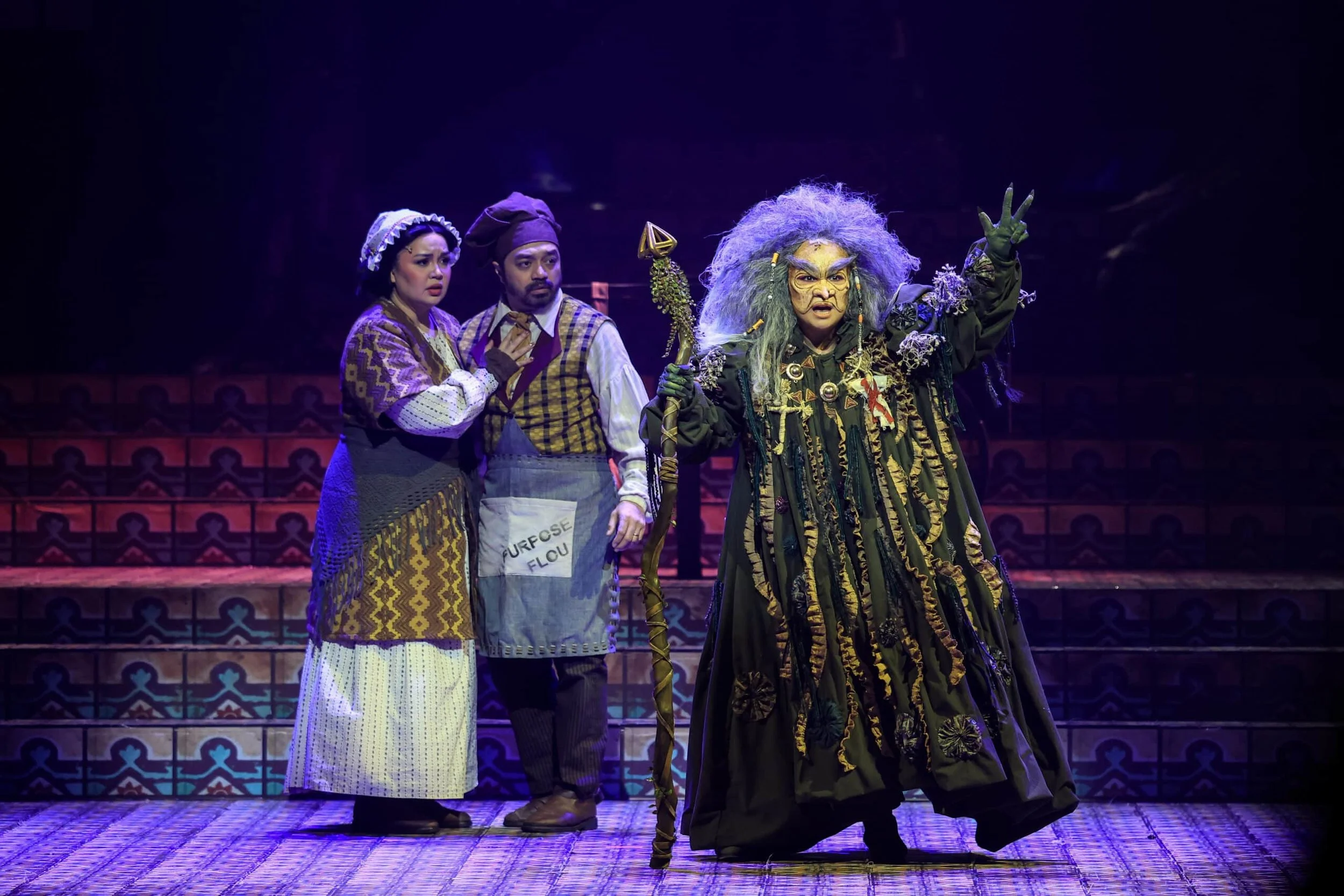 Lea-Salonga-as-The-Witch-Mikkie-Volante-as-the-Baker_s-Wife-and-Nyoy-Volante-as-the-Baker-in-Theatre-Group-Asia_s-Into-the-Woods.-Photo-by-Mark-Alvarez-scaled.jpg