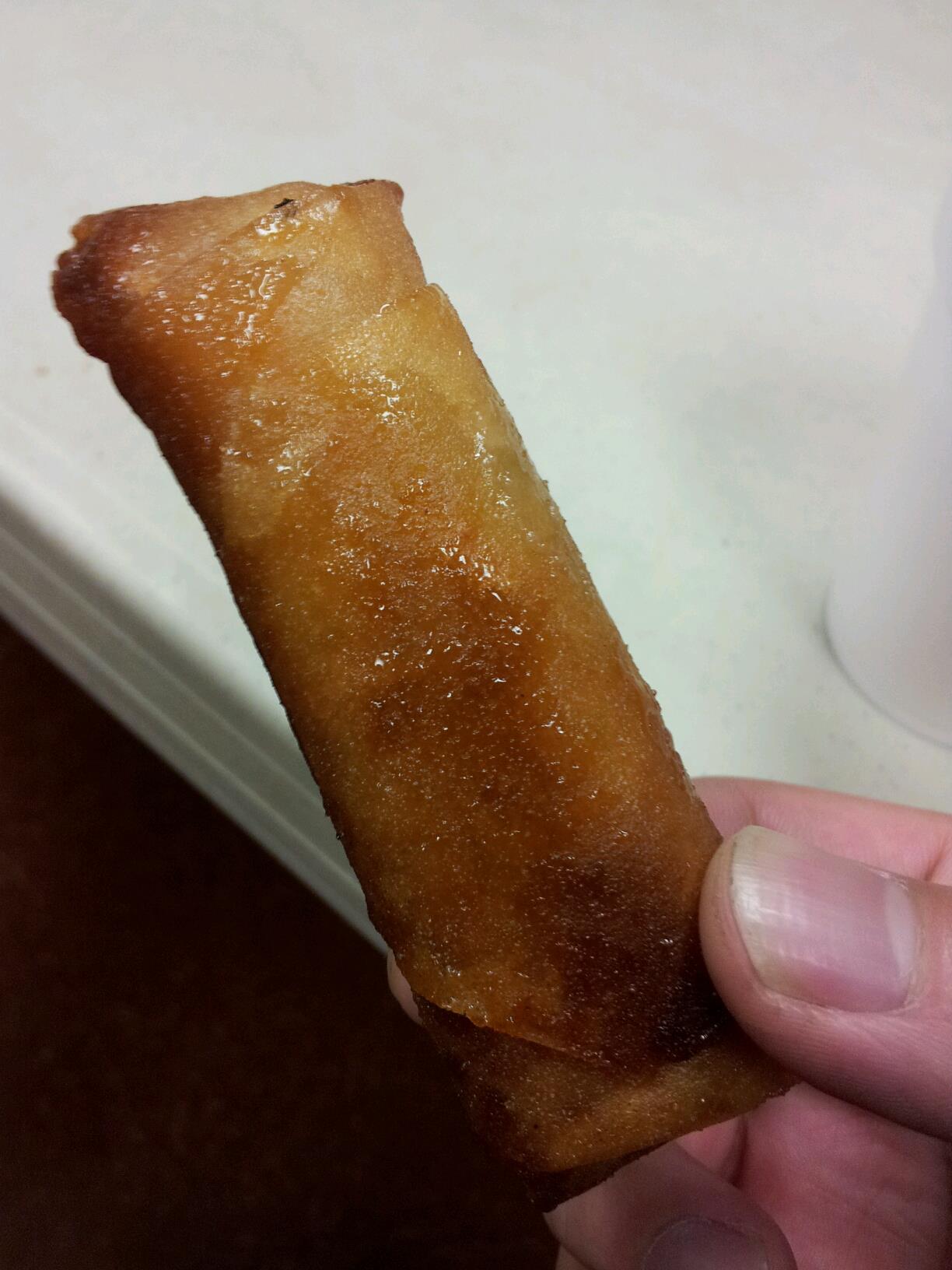 Turron (plantain wrapped in rice paper with drizzled honey)