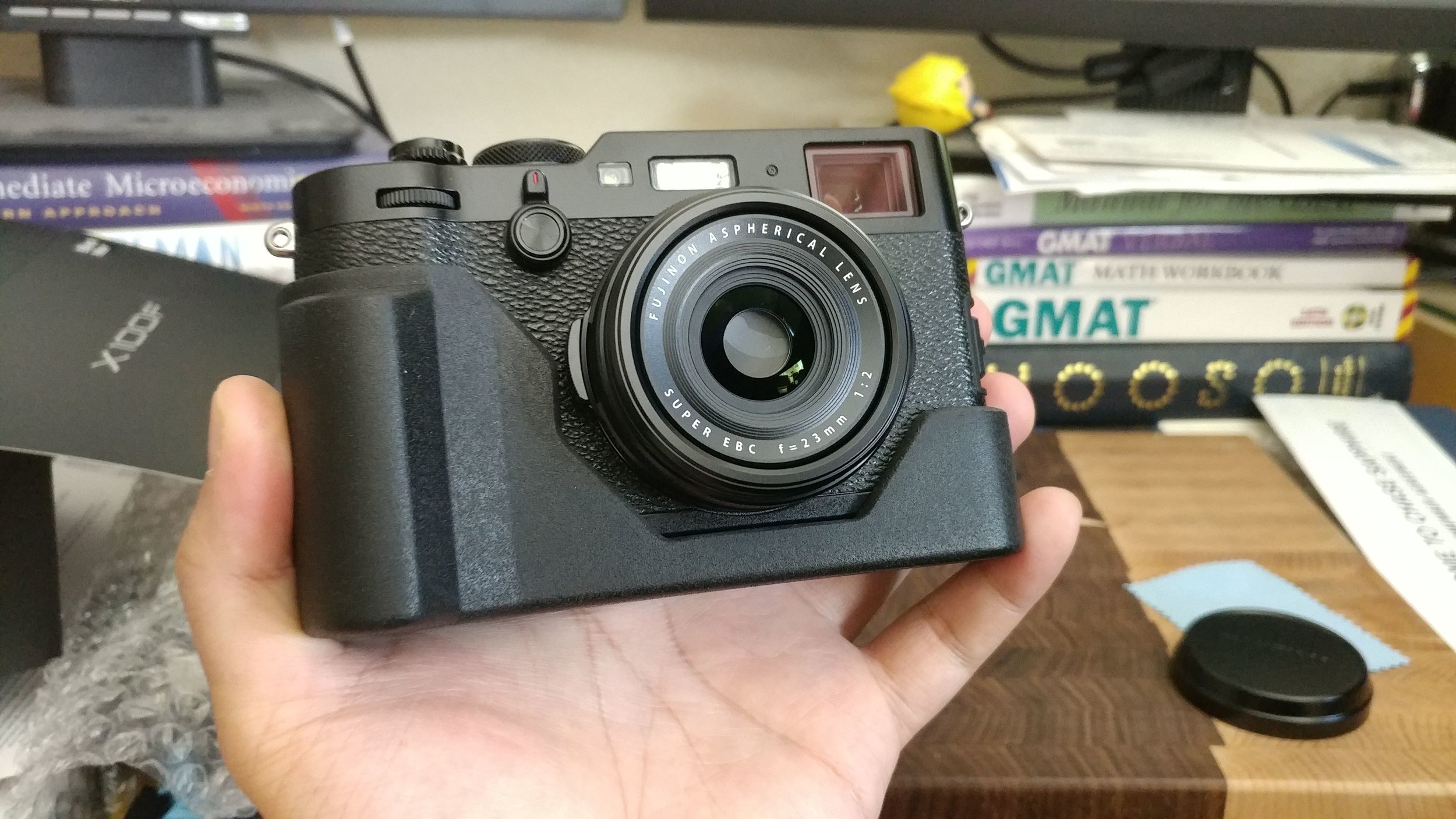 X100F with JB Camera Designs hand grip. 