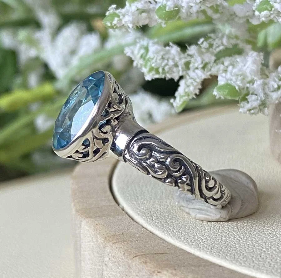 sterling silver blue topaz faceted gemstone ring
