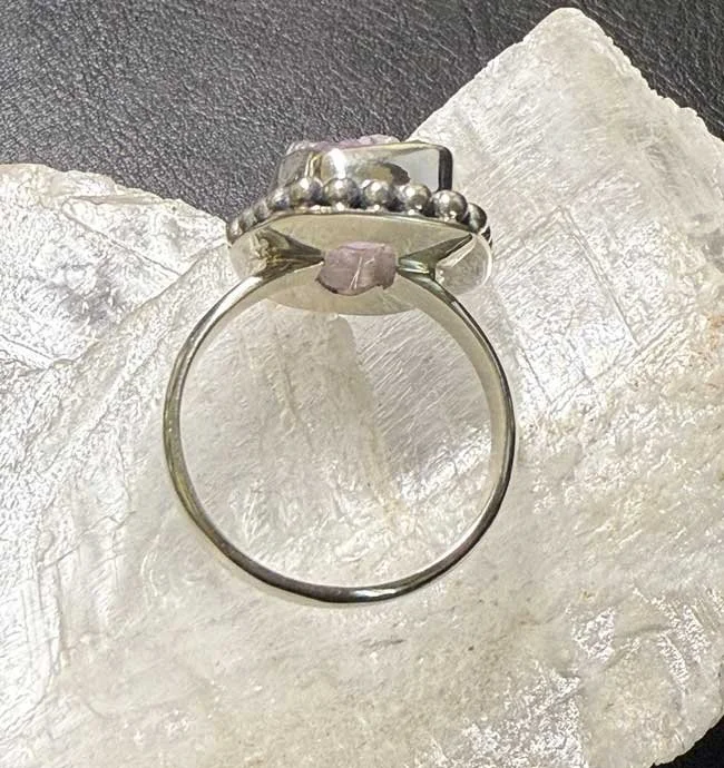 Raw amethyst crystal ring set in sterling silver with beaded detailing, handmade in Bali,