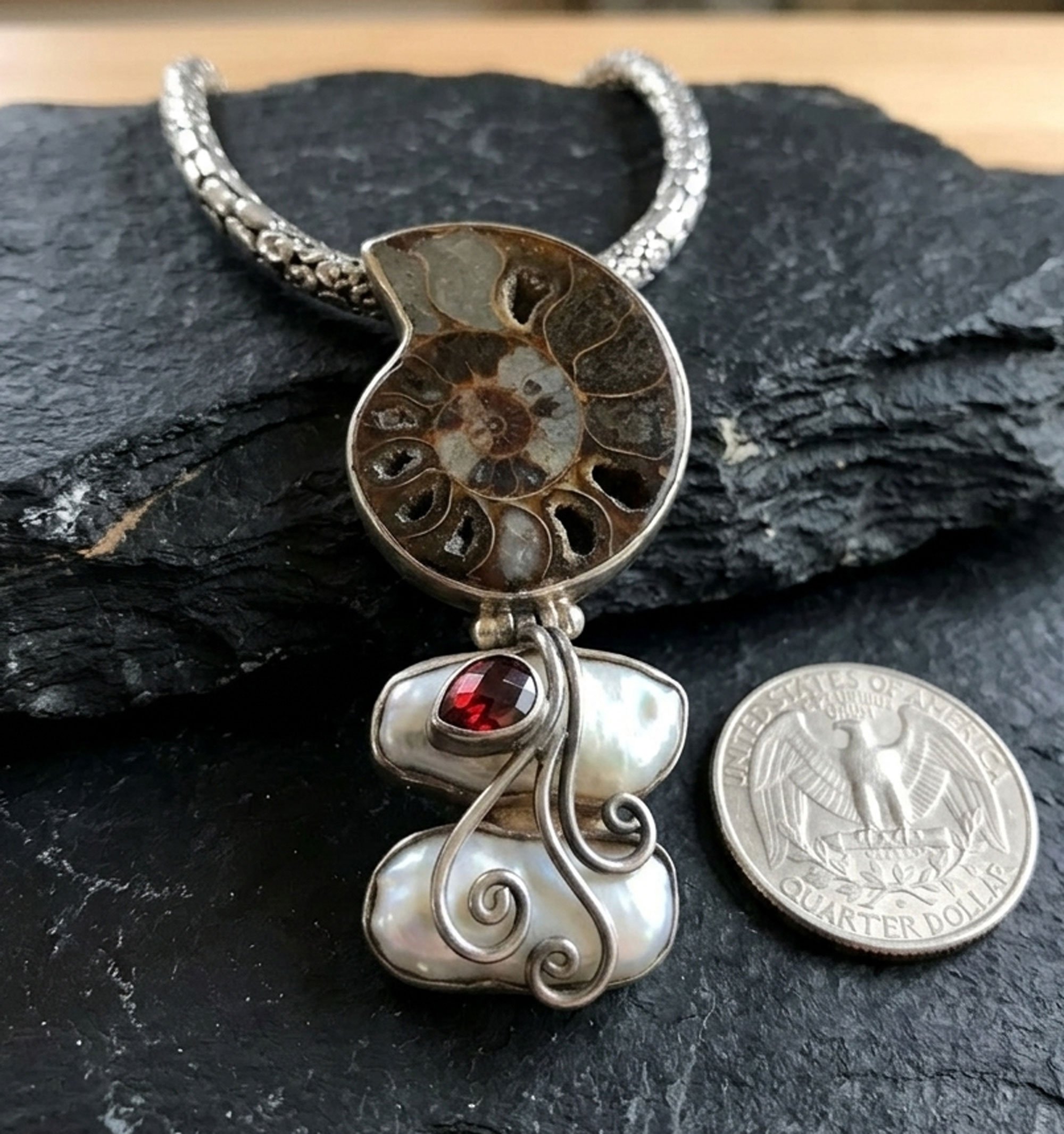 Ammonite fossil pendant with pearl and garnet size comparison artisan sterling silver jewelry