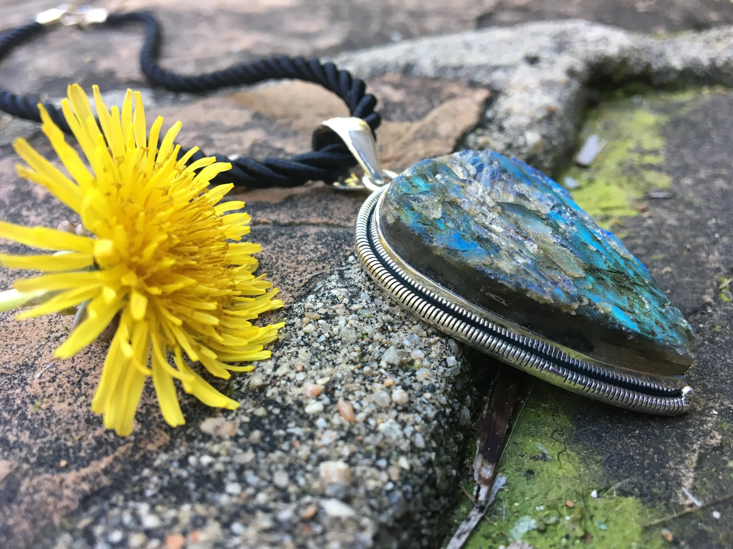 Handmade sterling silver Labradorite pendant with iridescent blue-green fire. A Boho artisan gemstone necklace for protection, creativity, and style.