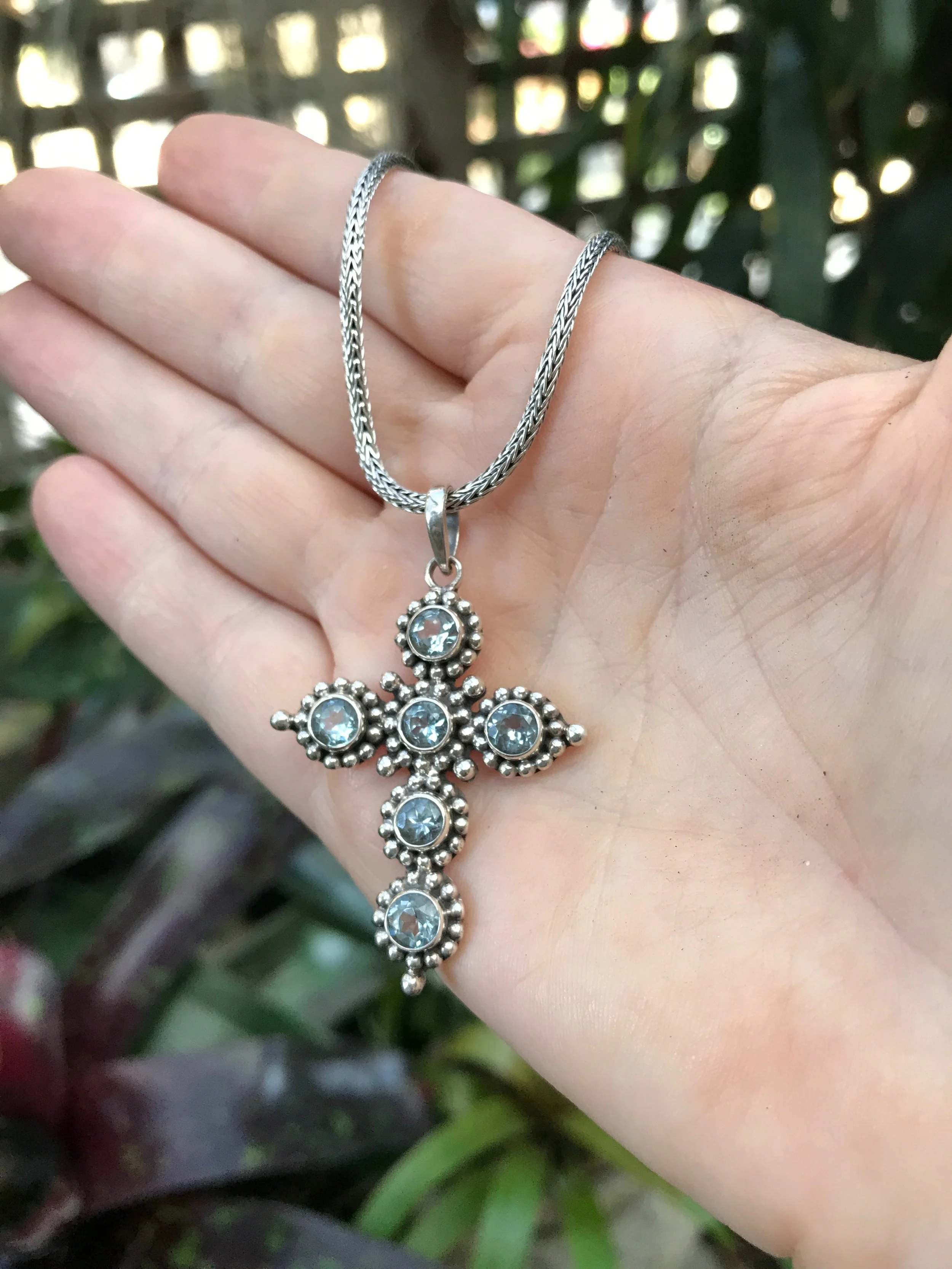 Cross pendant, blue topaz pendant, vintage jewelry, antique finish, sterling silver cross, elegant design, gemstone cross, sophisticated jewelry, timeless charm