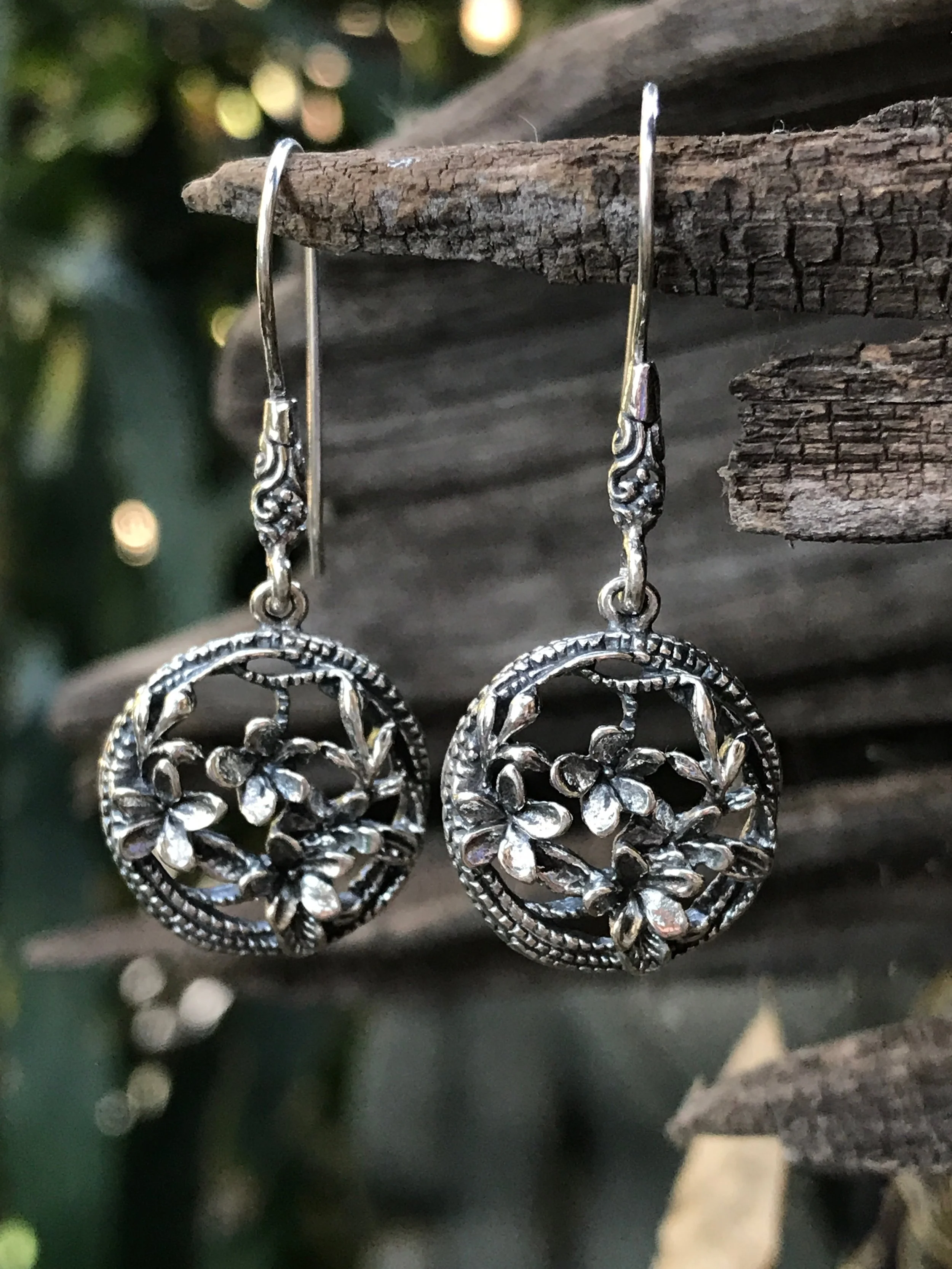 sterling silver earrings with flower design