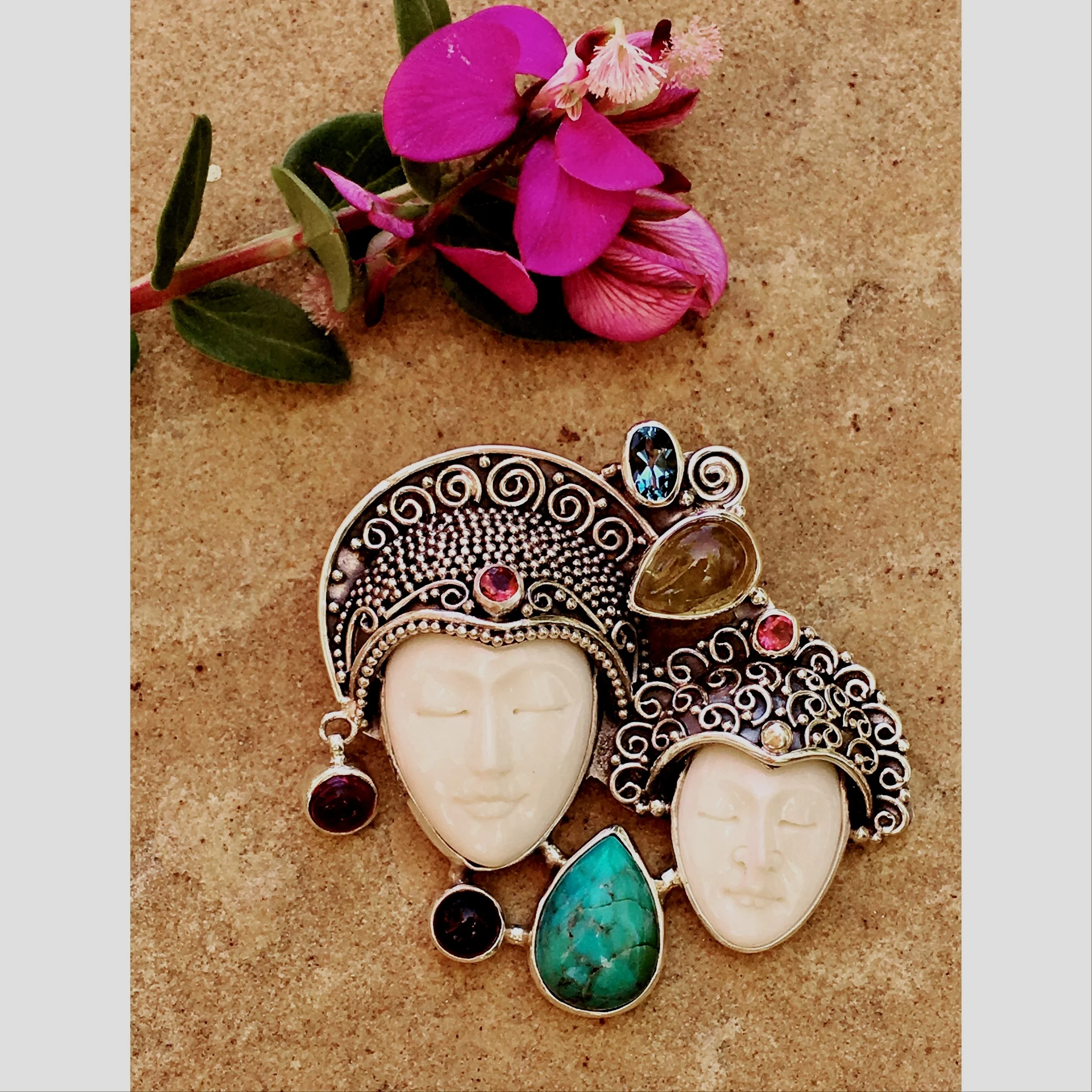 Bali Goddess pendant with mixed gemstones. Blue Topaz, Citrine, Pink Tourmaline, Turquoise and Garnet gemstone