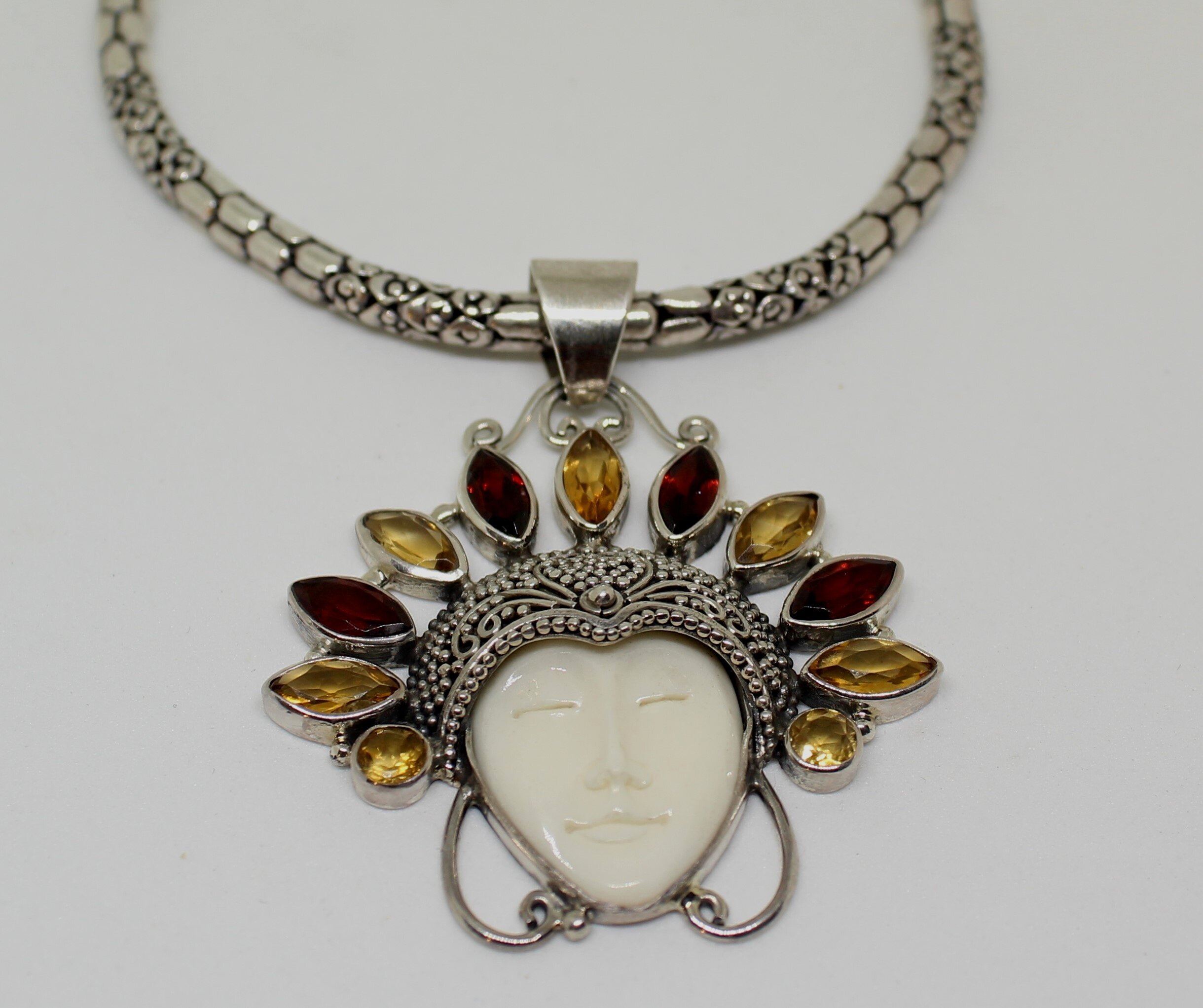 BALINESE GODDESS , CITRINE, GARNET, BONE CARVED FACE STERLING SILVER