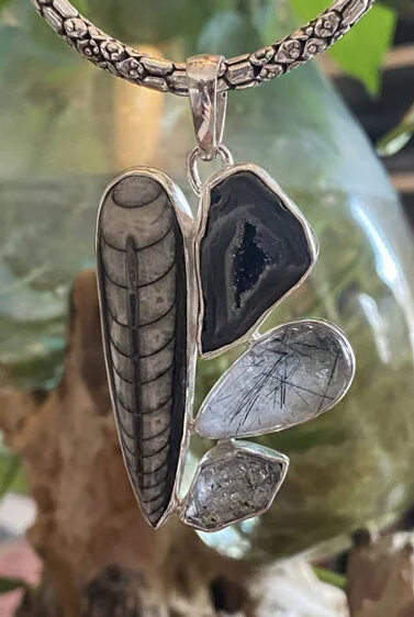 Fossilized Orthoceras, Druzy, Rutilated Quartz and Herkimer diamond pendant.