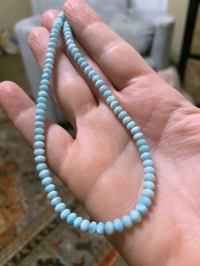 Larimar bead necklace features hand-cut rondelle beads.