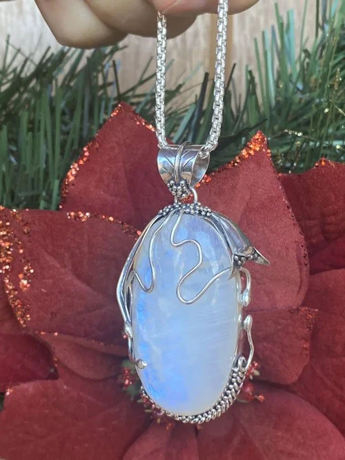 Rainbow Moonstone pendant set in sterling silver, made in Bali
