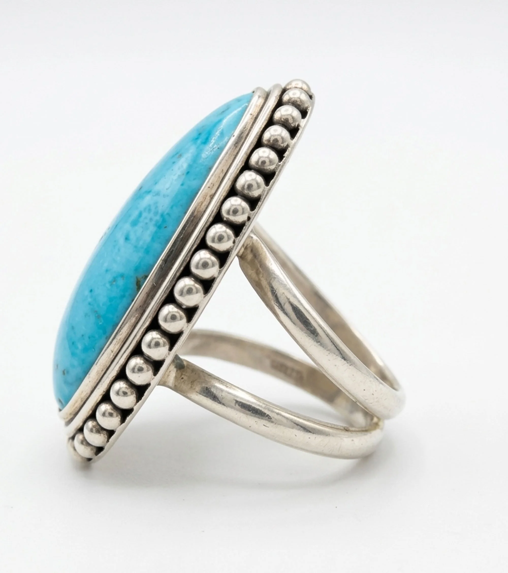 Side view of sterling silver Larimar ring with double‑band shank