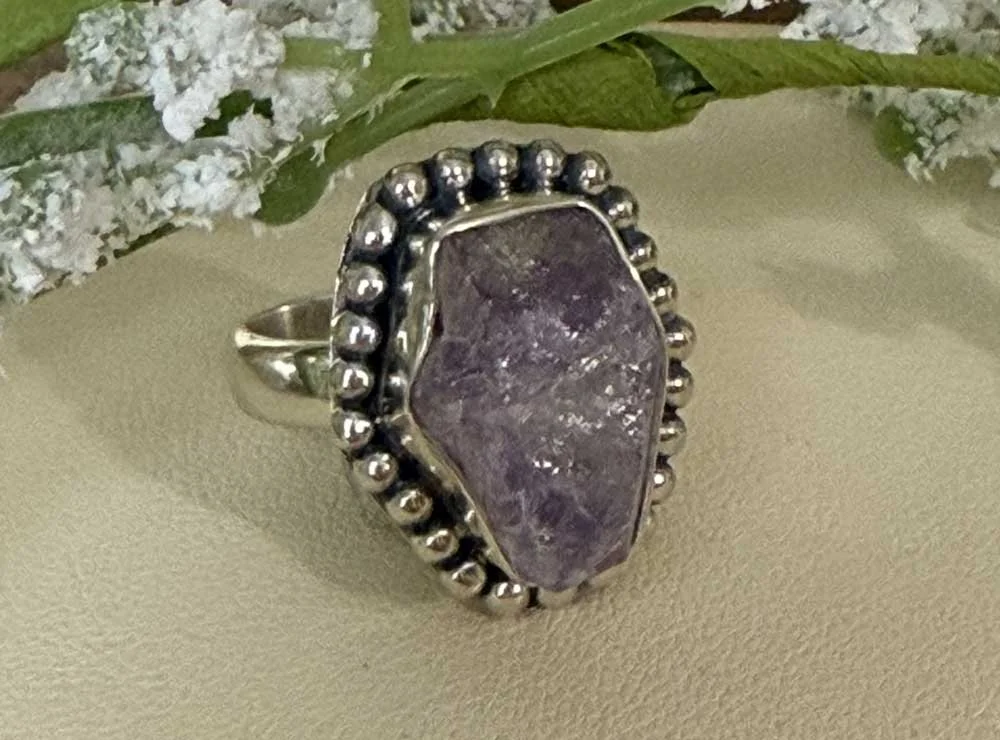 Raw amethyst crystal ring set in sterling silver with beaded detailing, handmade in Bali,