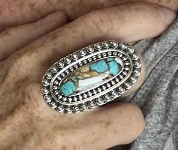 Handcrafted sterling silver ring with rare Spiny Oyster Turquoise. Unique Boho statement piece blending ocean blues & earthy tones.