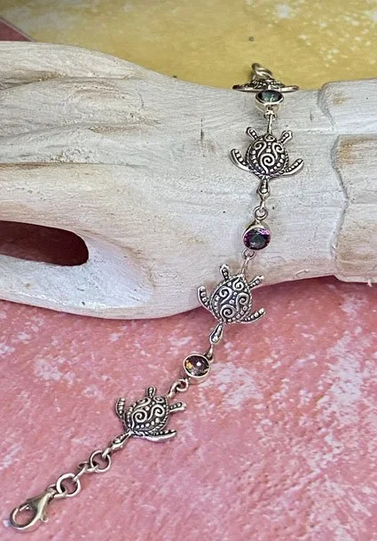 Silver turtle and topaz bracelet, Amethyst and silver bracelet, Artisan-crafted turtle jewelry, Island-style bracelet.
