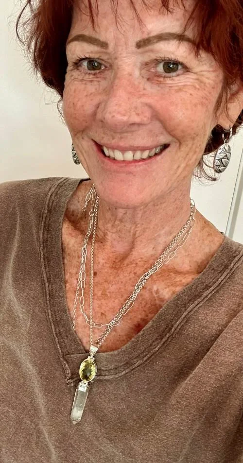 Sterling silver lemon quartz and clear quartz pendant.