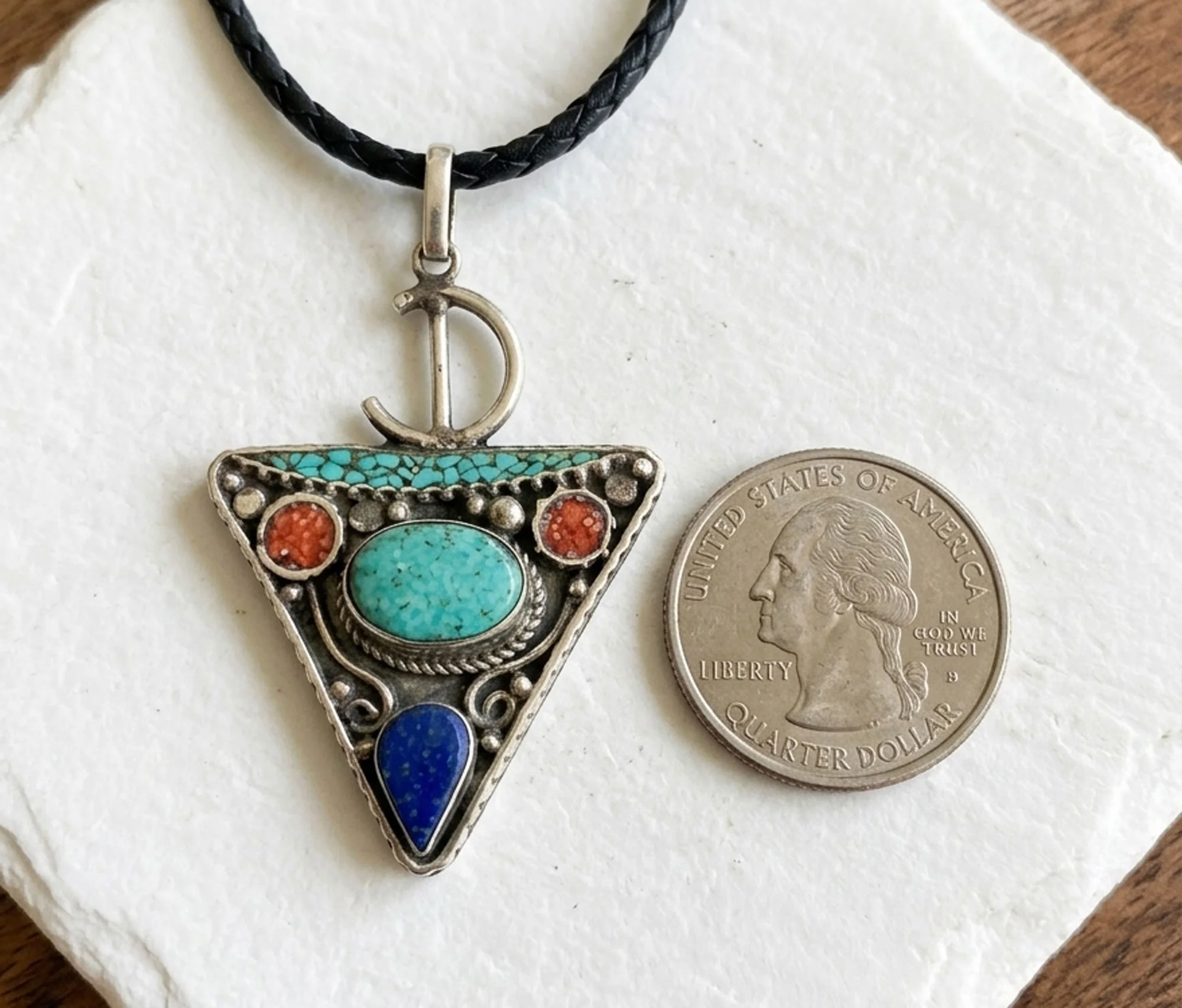 Sterling silver artisan gemstone pendant with turquoise, lapis, and tribal boho design.