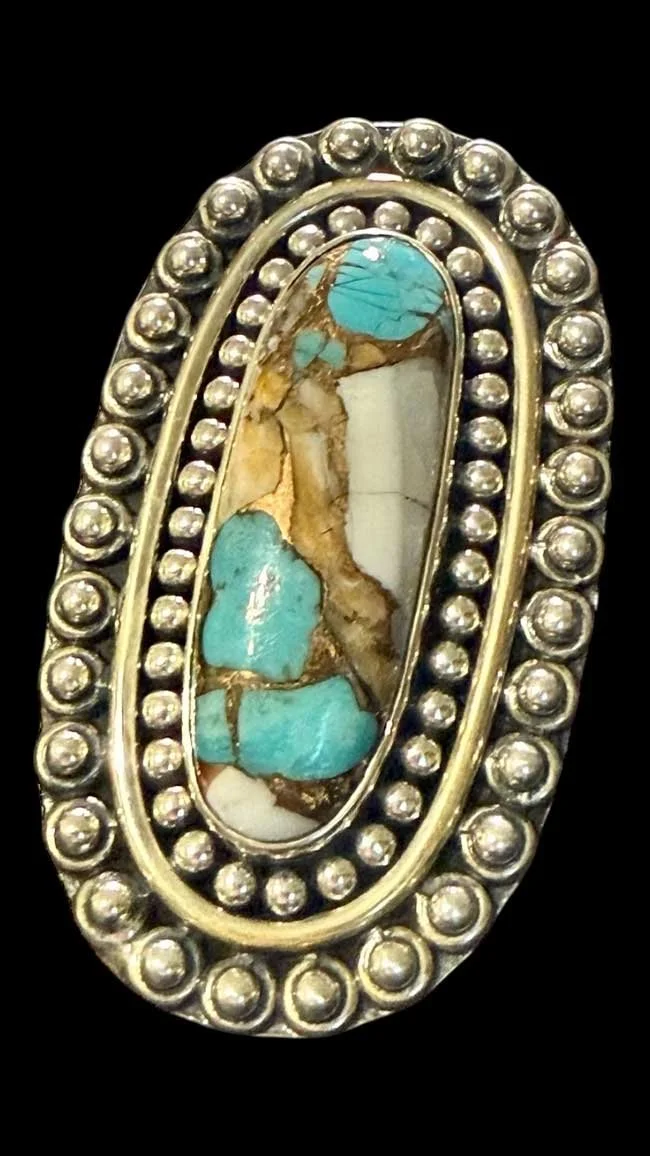 Handcrafted sterling silver ring with rare Spiny Oyster Turquoise. Unique Boho statement piece blending ocean blues & earthy tones.