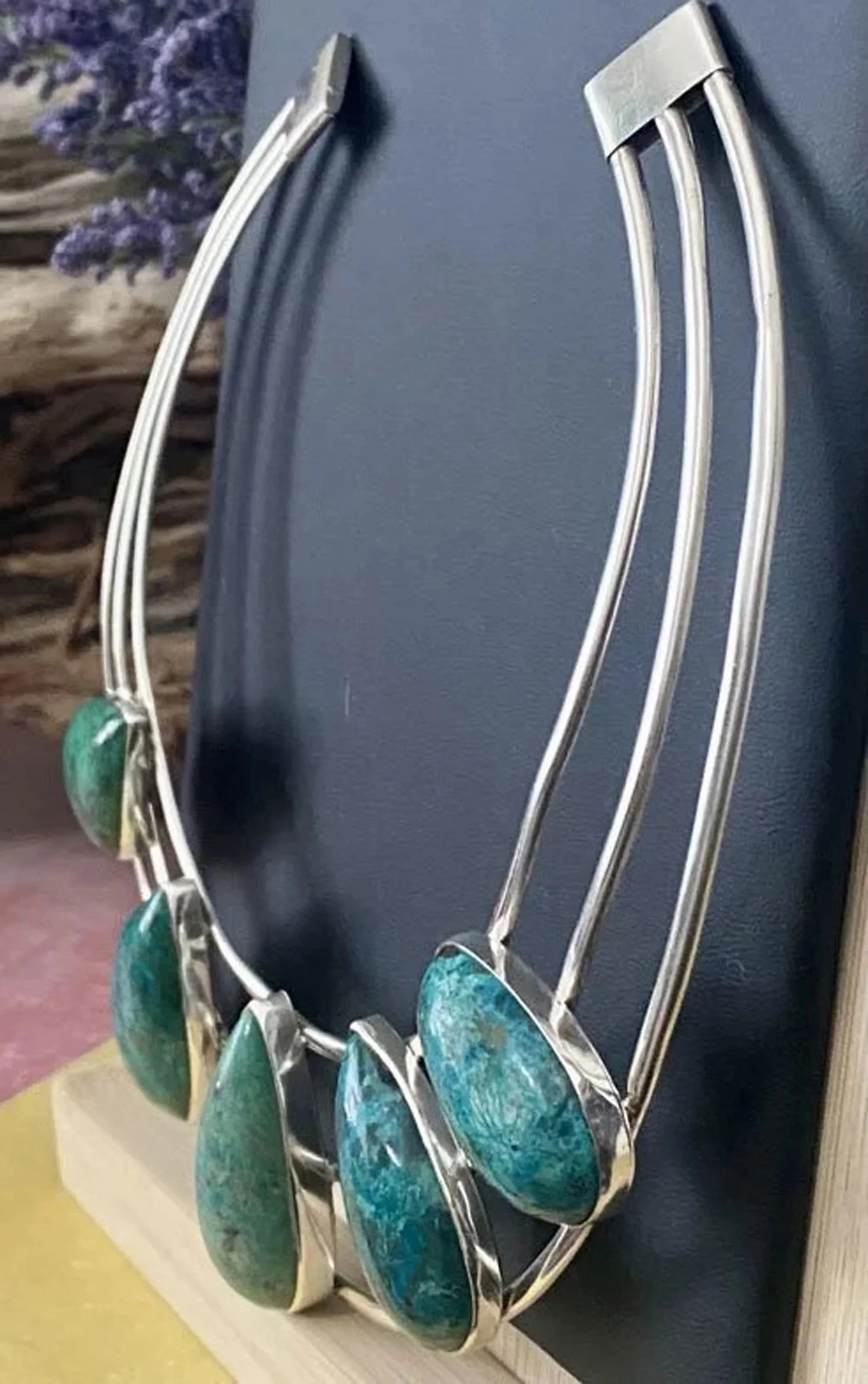 Chrysocolla statement collar necklace side view with natural turquoise stones in sterling silver handcrafted artisan design