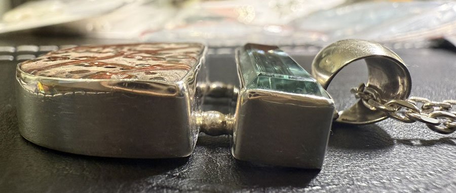 Boho artisan gemstone necklace featuring natural Red Jasper and Blue Obsidian set in sterling silver