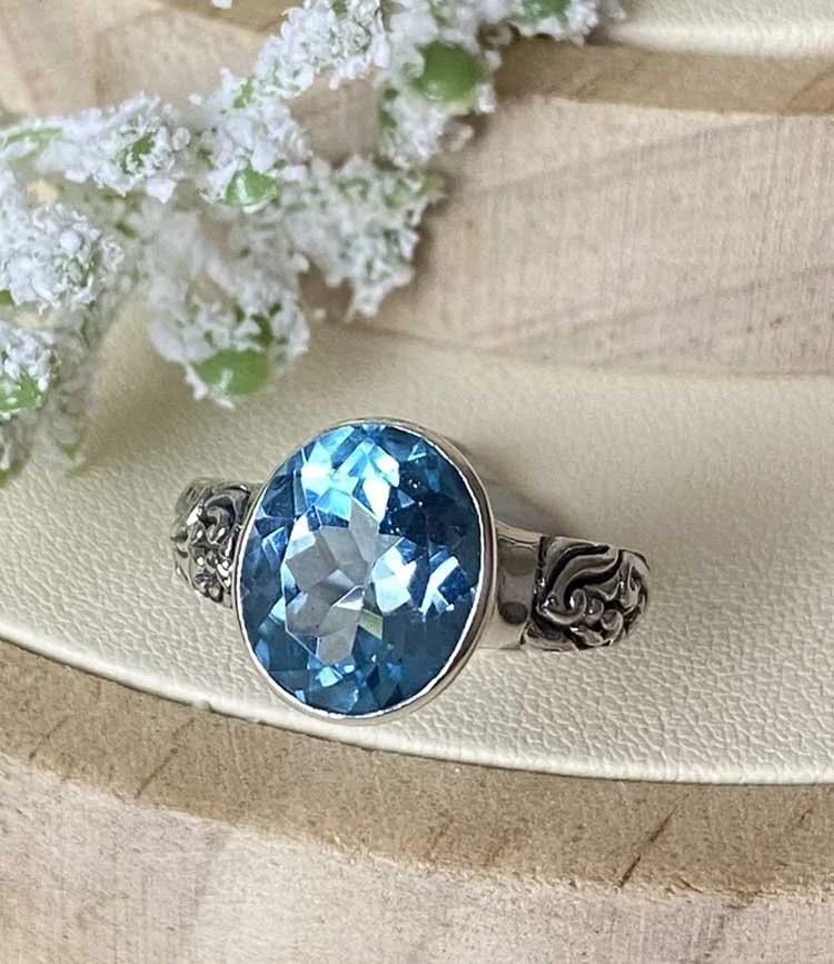sterling silver blue topaz faceted gemstone ring, December birthstone