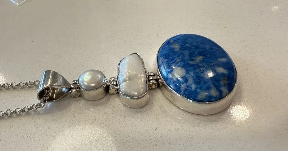 Lapis and pearl pendant set in sterling silver