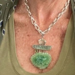 Peridot gemstone Artisan jewelry Organic gemstone jewelry Handmade Bohemian jewelry Unique statement necklace Natural stone pendant Nature-inspired jewelry