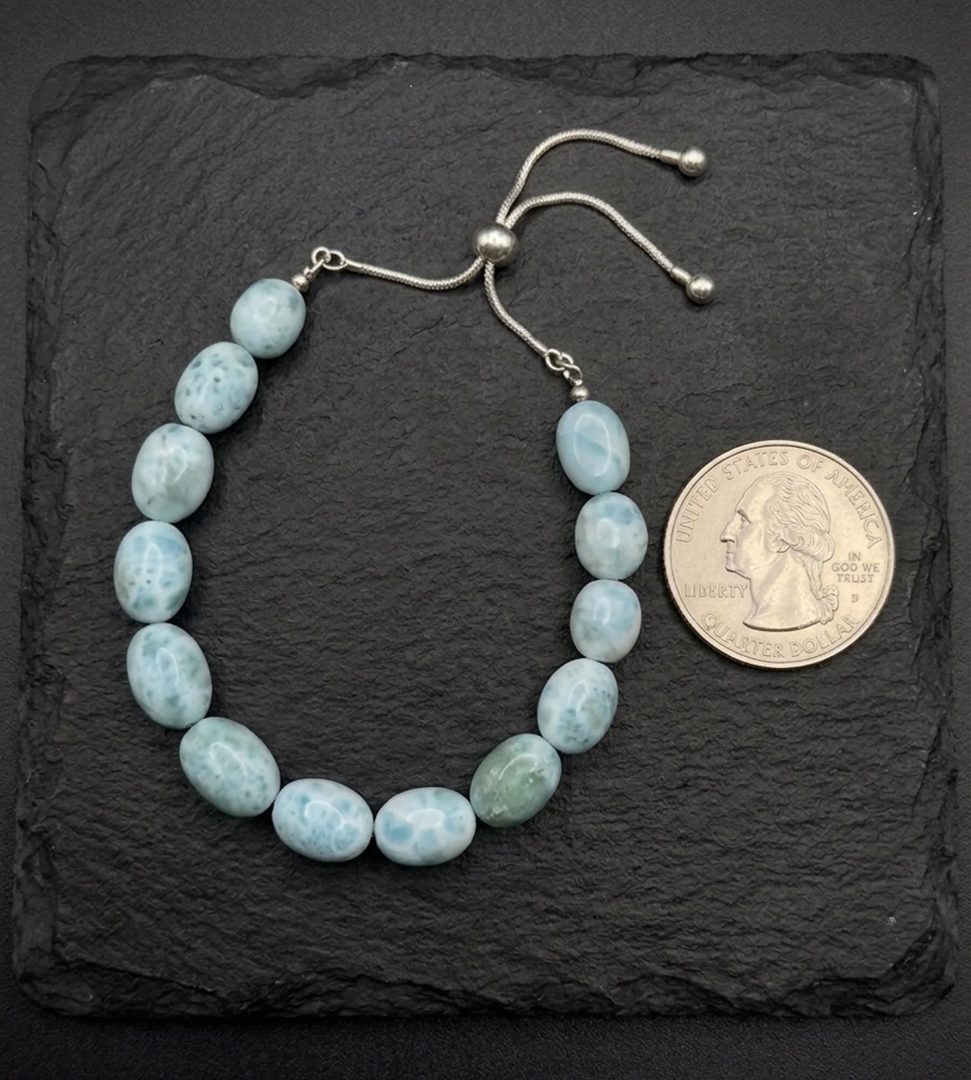 Island Calm Larimar Bracelet with oval larimar gemstone beads and sterling silver adjustable slider closure artisan jewelry