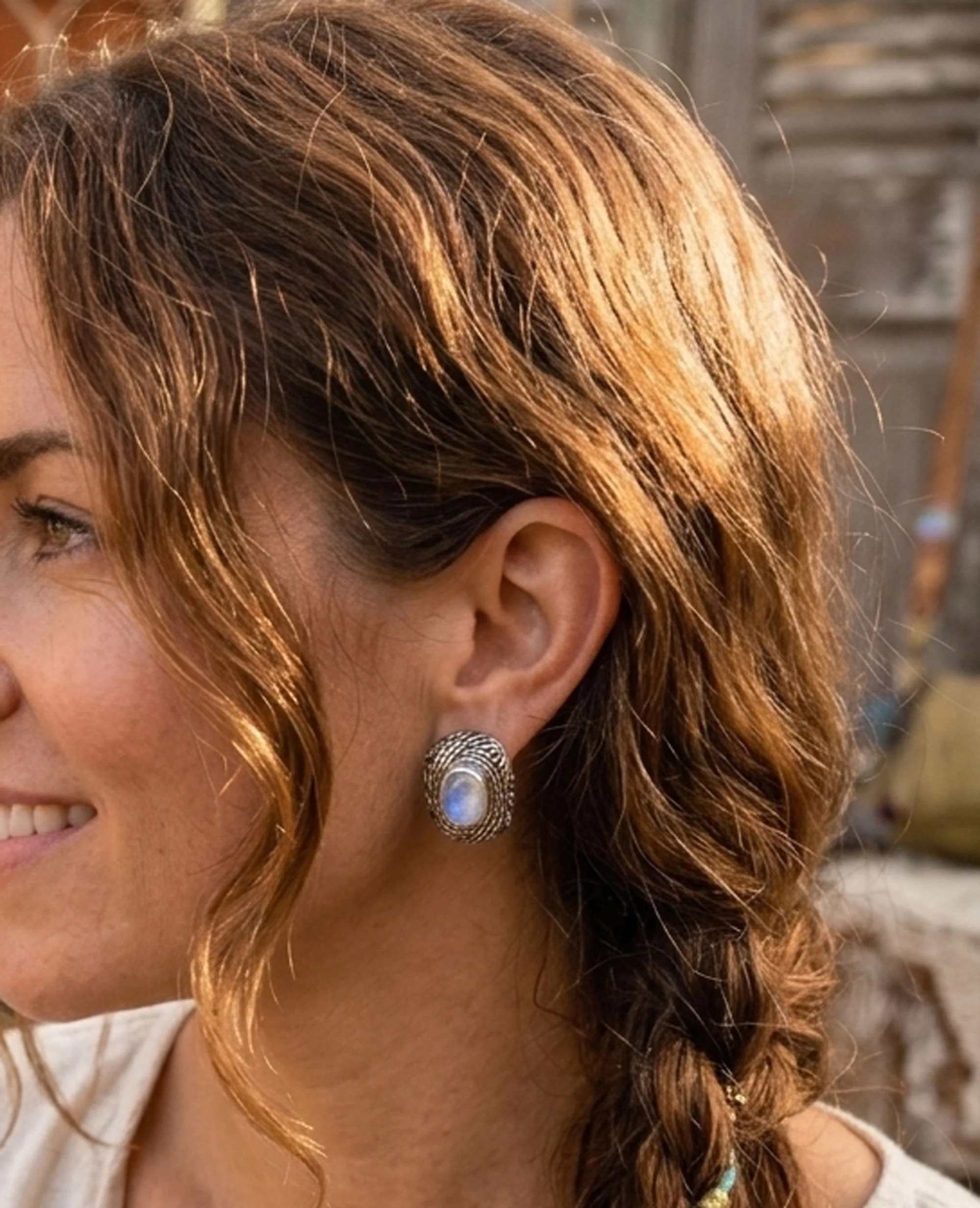 Moonstone sterling silver stud earrings worn on model boho gemstone jewelry