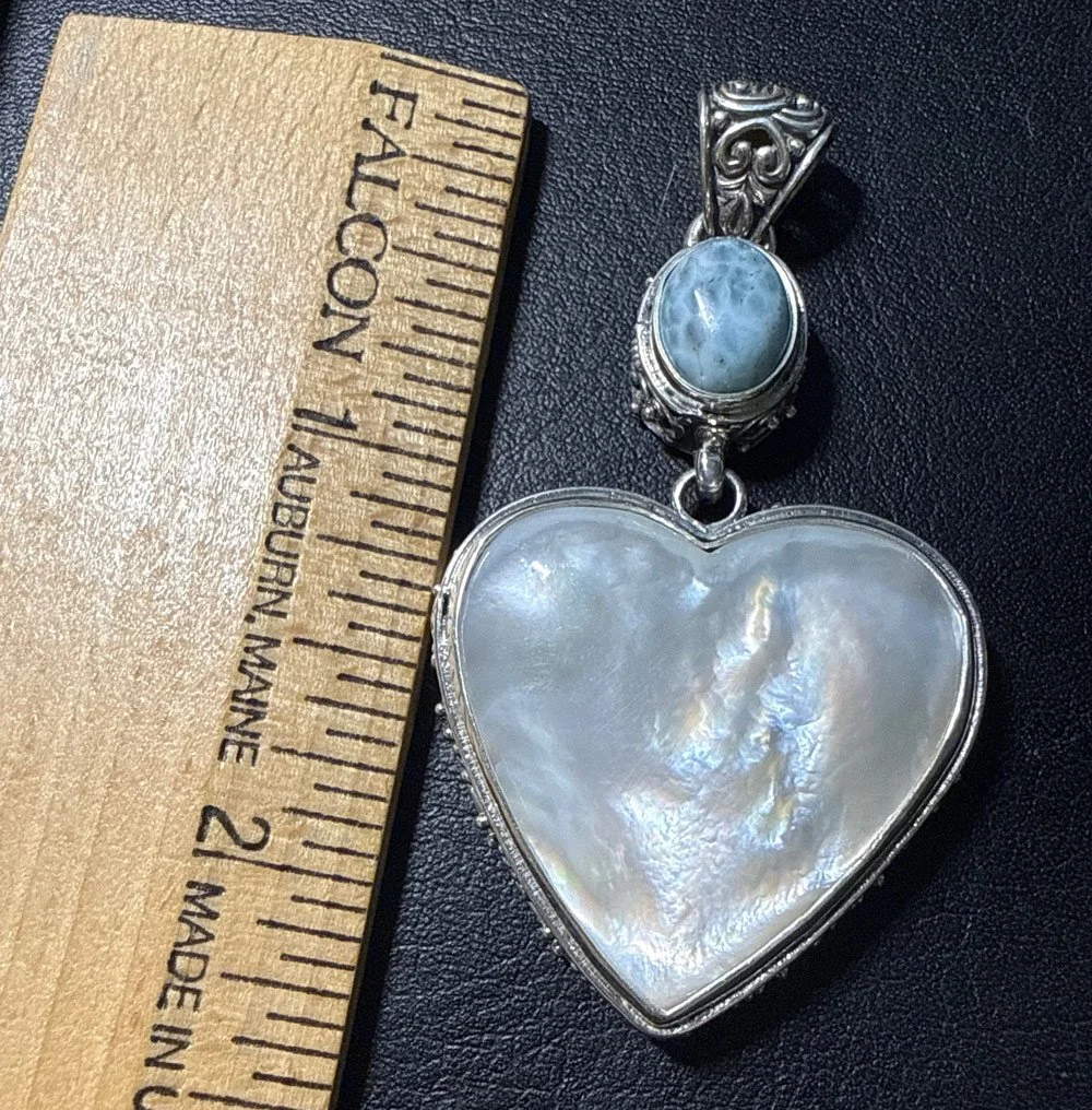 Large Mother of Pearl heart and Larimar sterling silver pendant shown beside ruler for size