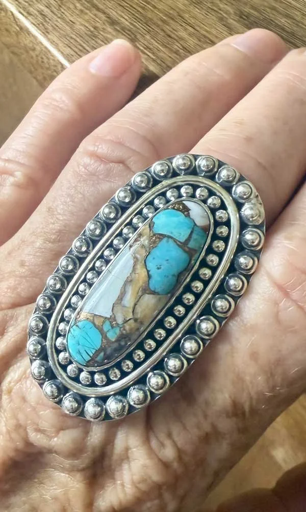 Handcrafted sterling silver ring with rare Spiny Oyster Turquoise. Unique Boho statement piece blending ocean blues & earthy tones.