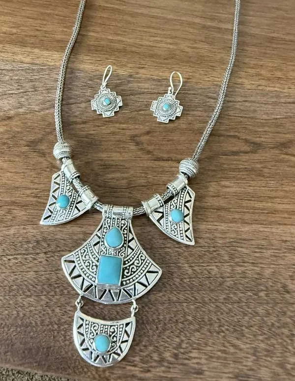 silver turquoise statement necklace and earrings
