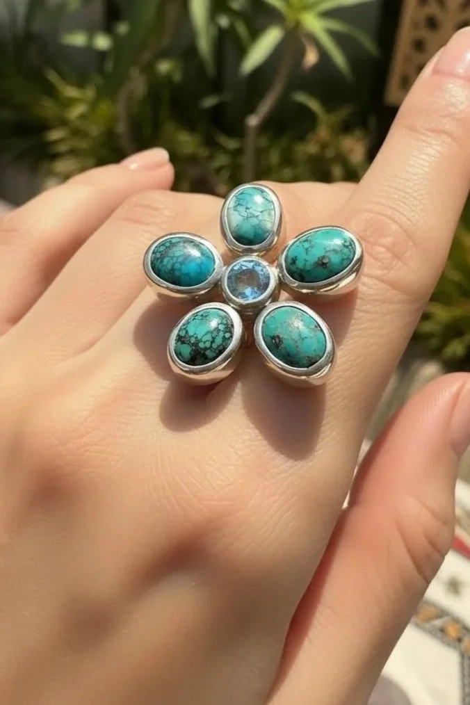 turquoise-blue-topaz-flower-ring-sterling-silver.jpg