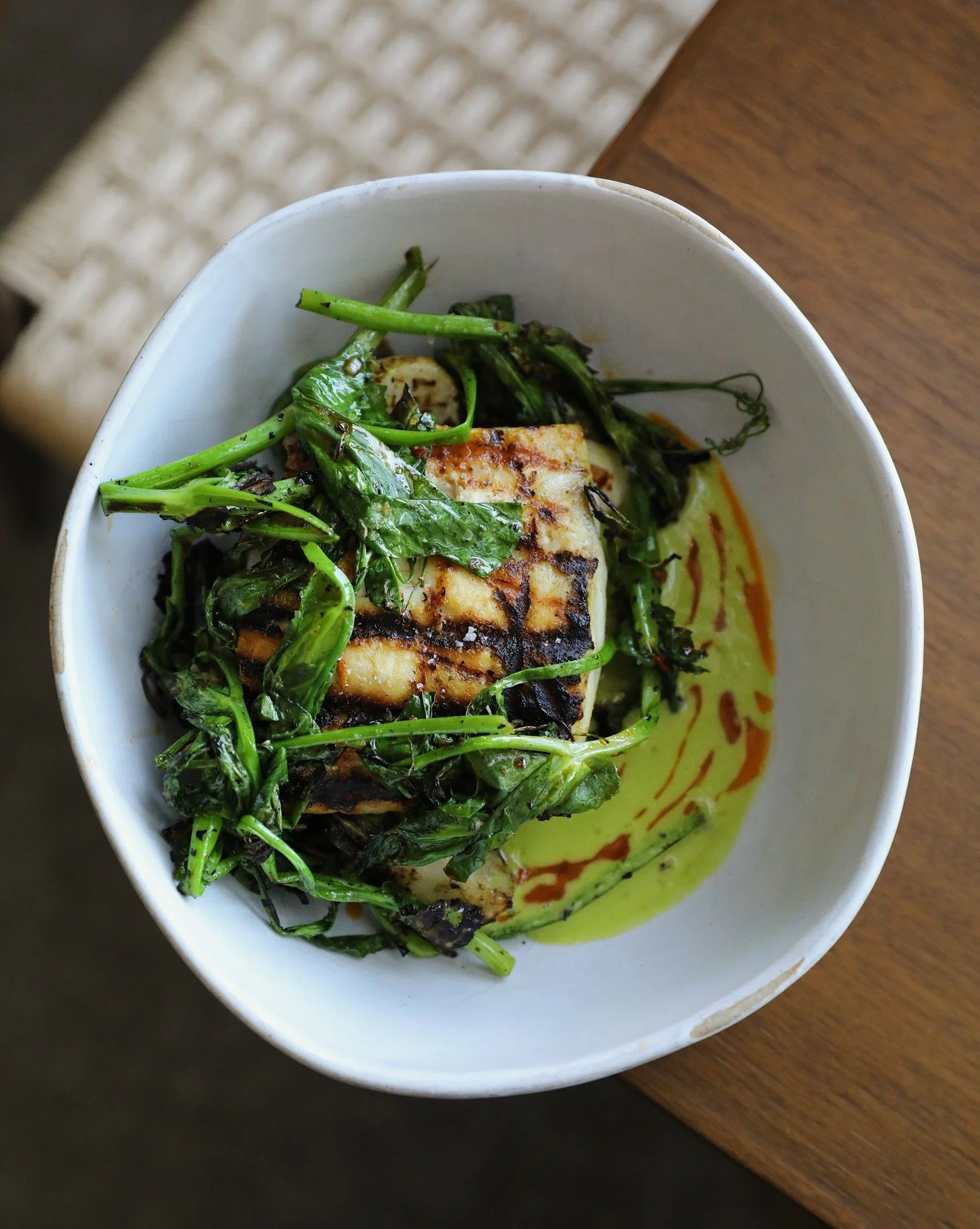 A beautiful smoky grilled halibut laid atop a butter herb sauce, turnips, and pea tendrils. One of our favorite proteins.
