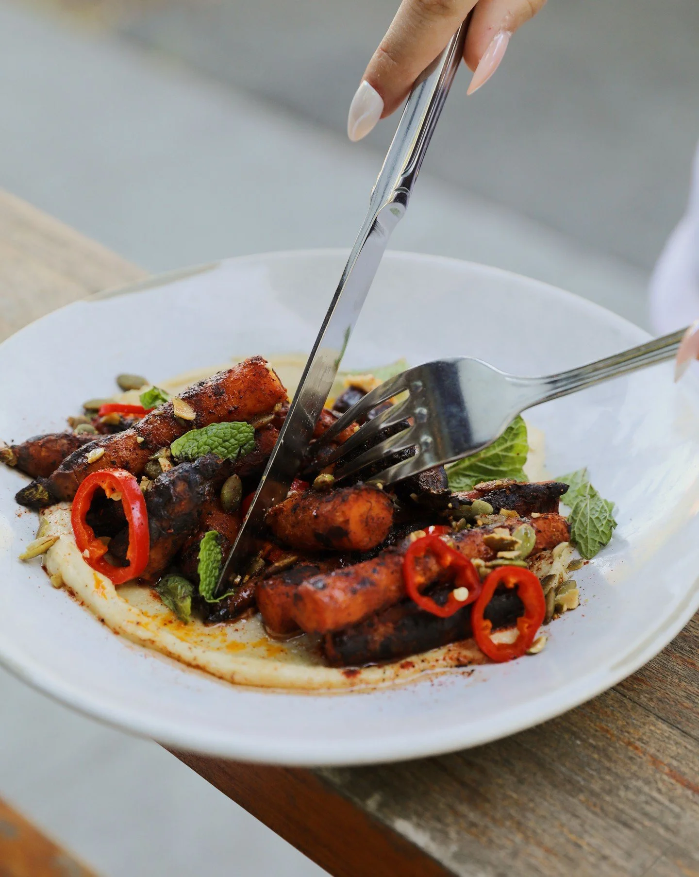 Roasted carrots, sesame, achiote, pickled pepper, honey. Let's dive in. 🥕

Bookings available in bio. 🔗