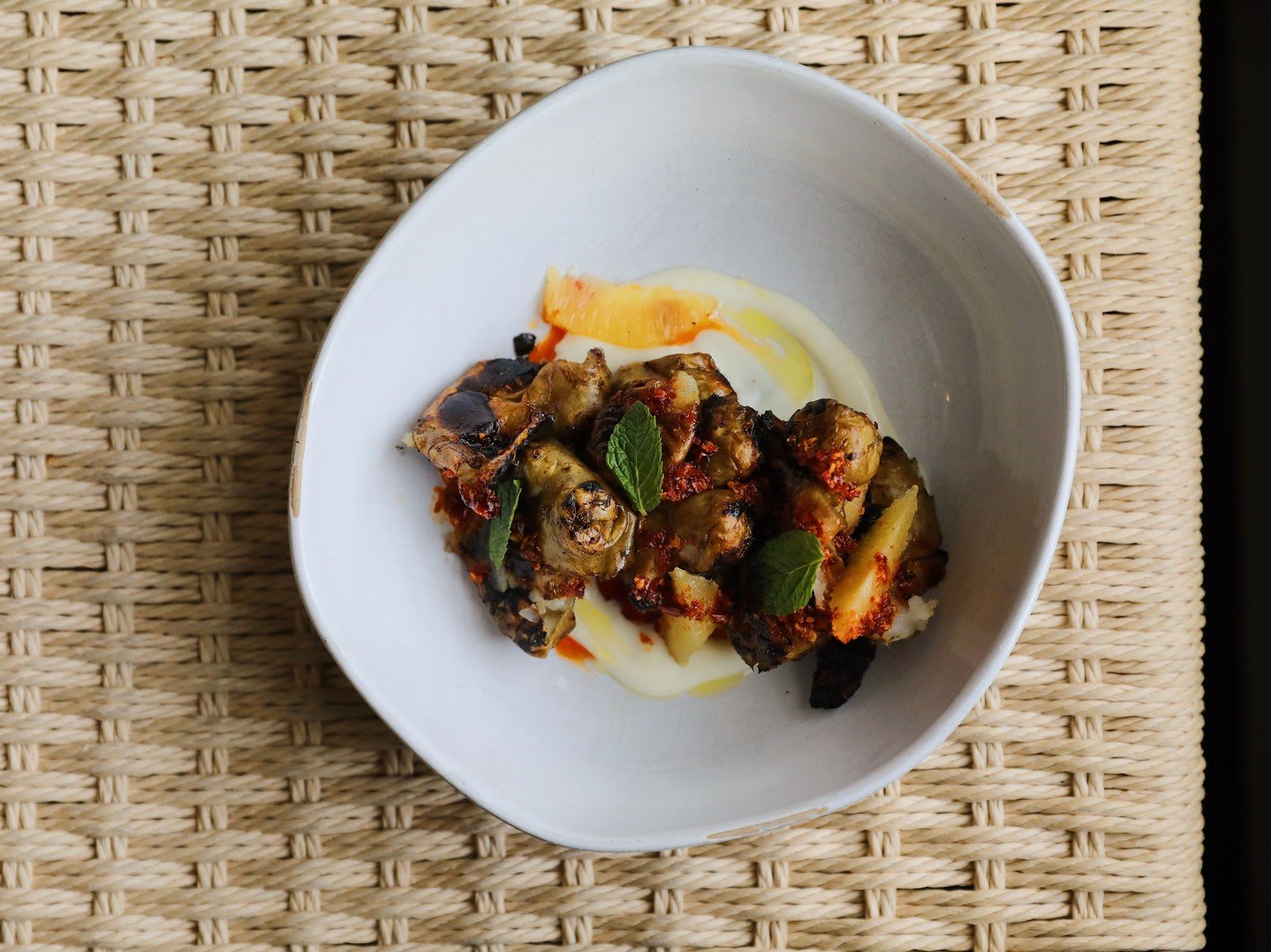 Charred, crispy, and kissed with heat. Our charred sunchokes are here for fall, dressed with chili-garlic crisp, garlic aioli, and a pop of mint.

#raccoltoseattle #fallmenu #generalharvestseattle