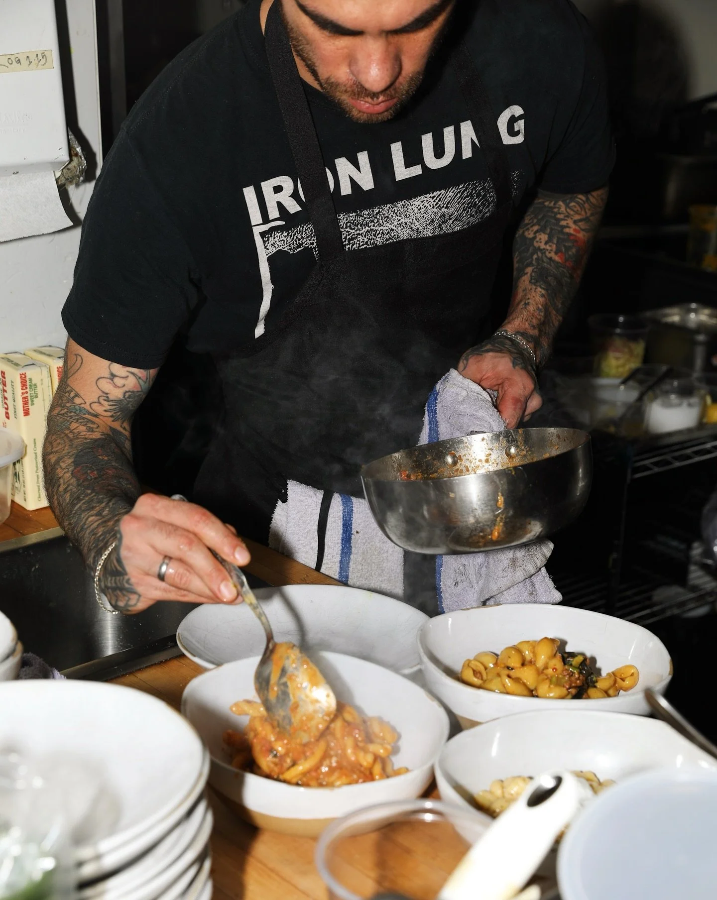 Our favorite part of the night. When service comes alive and hands are working on instinct. Steamy hot pasta, parmesan to top off, every order finished to the moment. 🍝

We're now taking reservations for Valentine's Day. Booking and menu are availab