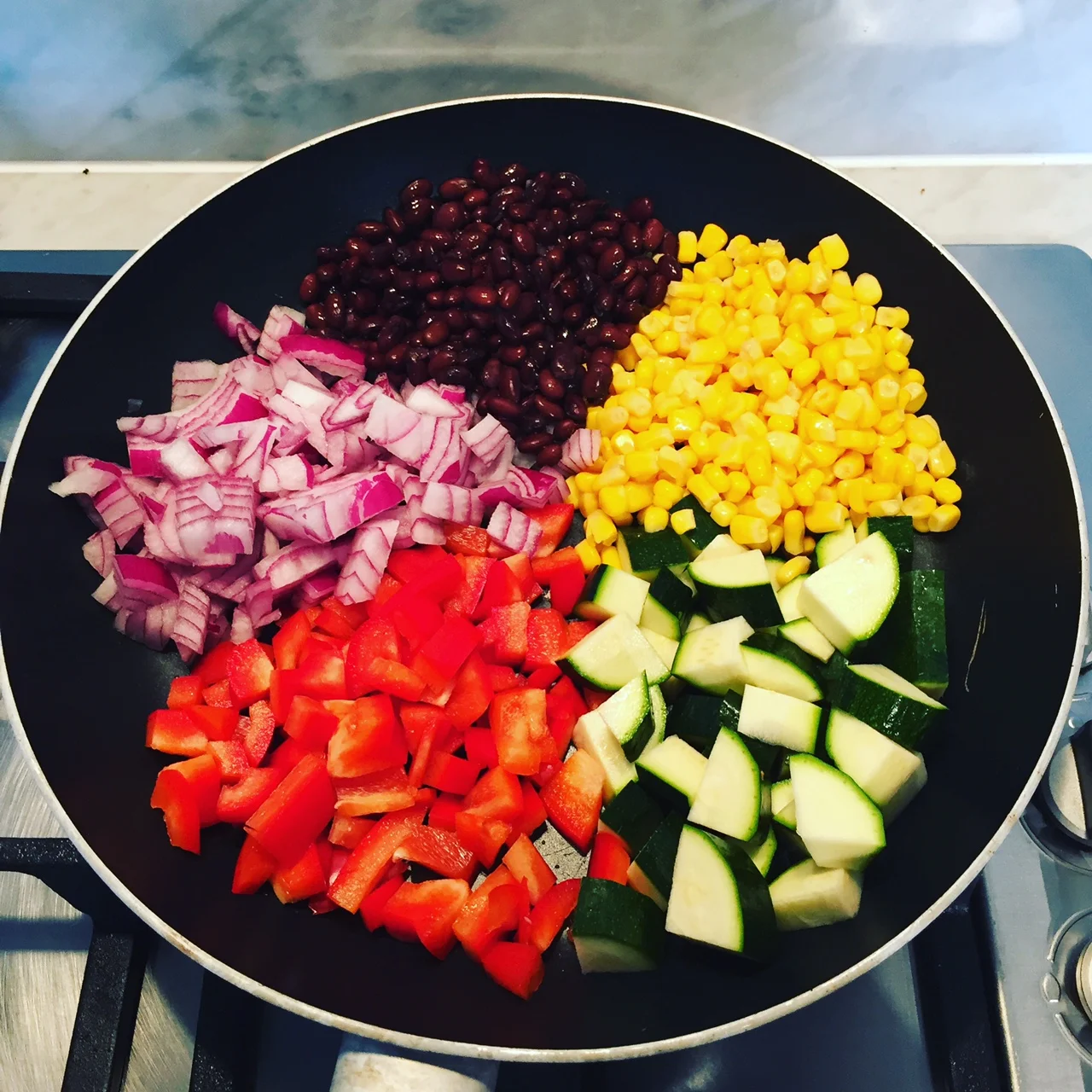 Veggies ready to be cooked in the pan.