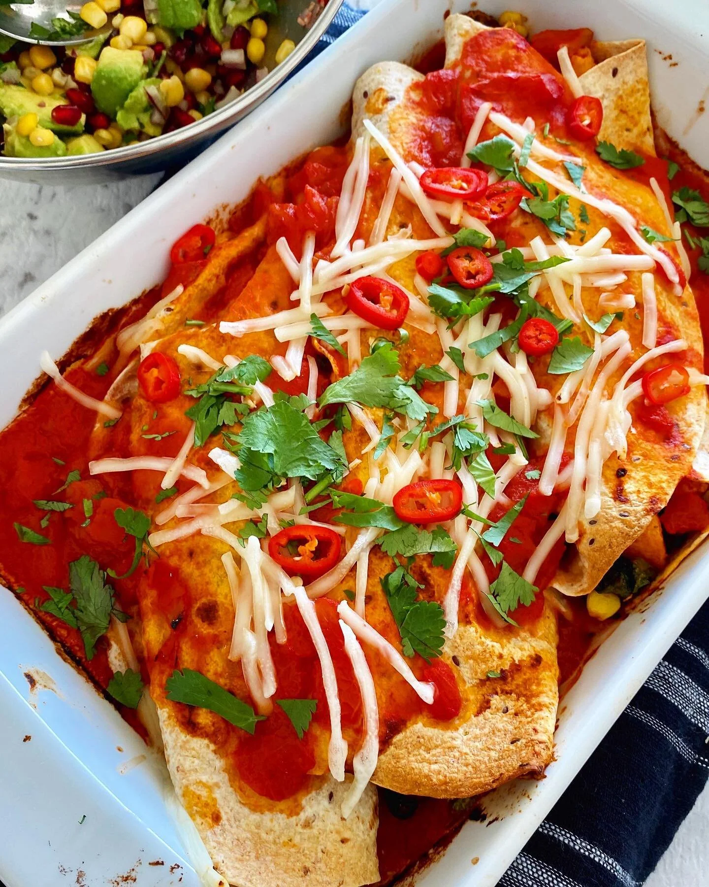 Vegan enchiladas 🌶🌽🍠🫑🥑 such a DELICIOUS dinner and works well as a left over for lunch the following day. ✏️Head to VegetarianEats.com.au for the full recipe #vegetarianeats #vegetarian #vegan #veganfood #veganrecipes #veganaustralia #veganrichaseverydaykitchen #enchiladas #yum #dinner #love #yummy #foodpics #instagood #instafood #veganlife #january #homemade #homecooking #foodlove #instaphoto #foodcoma #foodgram