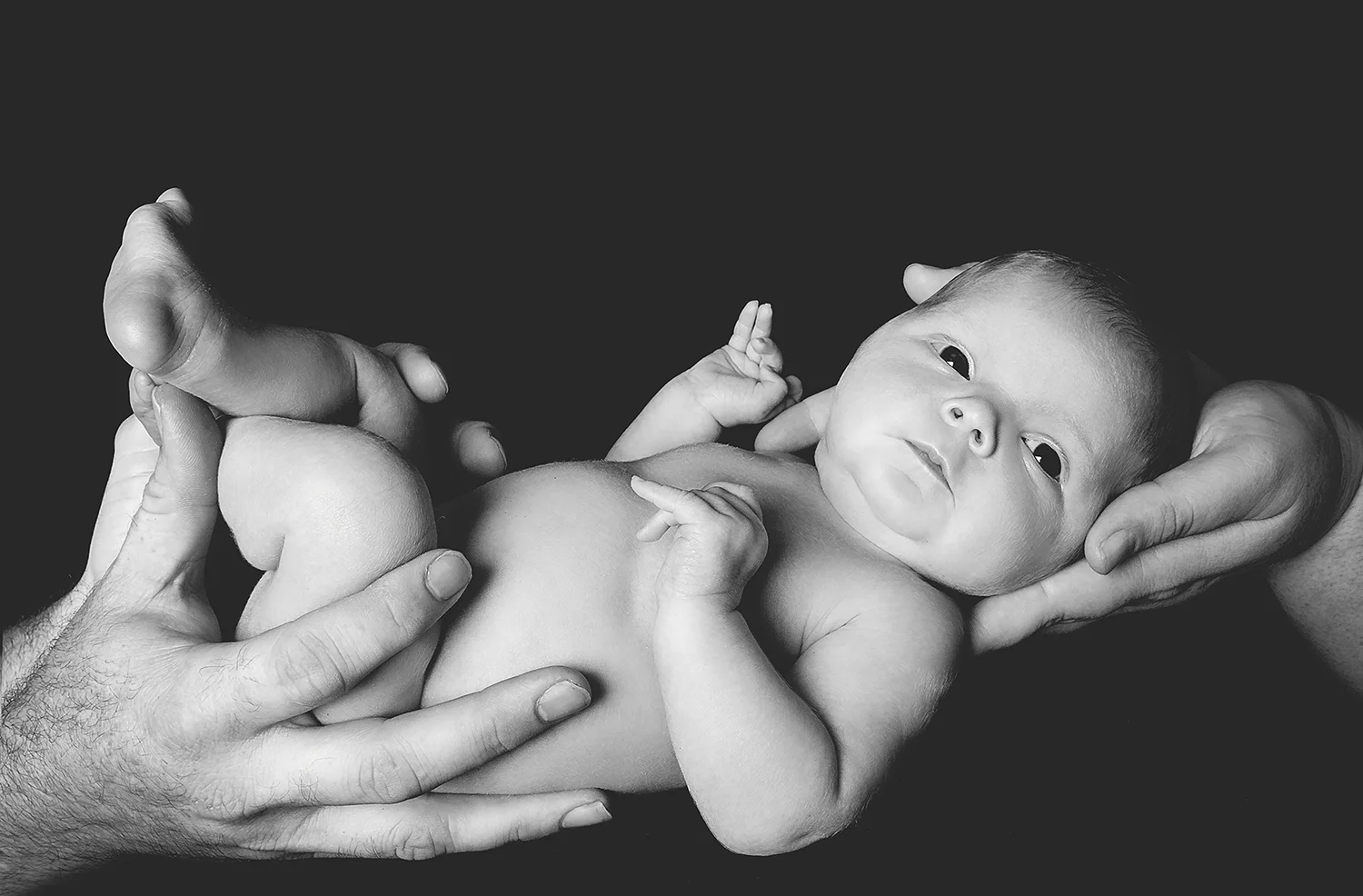 newborn_in_hands.jpg