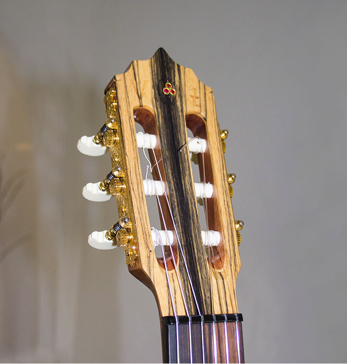 All headstocks need 3 Birmanian Rubies mounted in 18kt gold don't they?