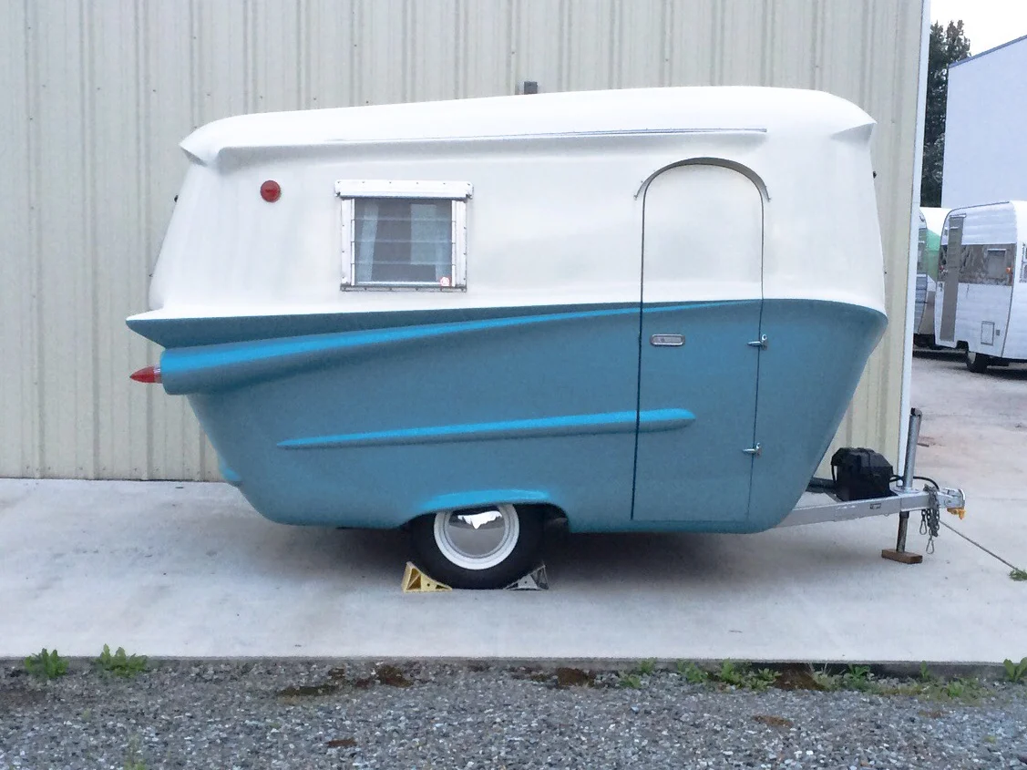 Yep, trailer and RV doors have and are always on the RIGHT! And isn't it just adorable?