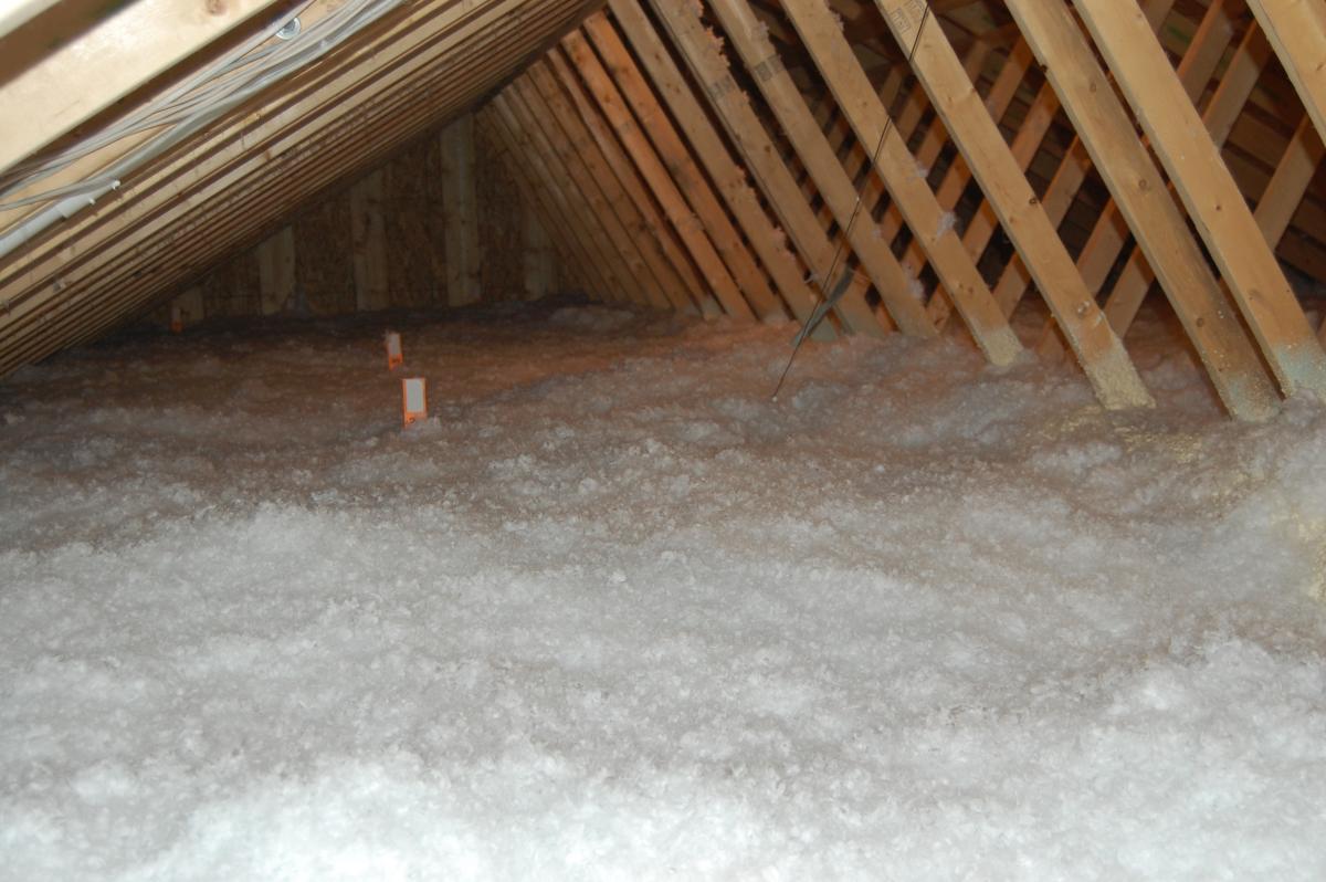 Loose-fill insulation is installed to the specified depth.jpg