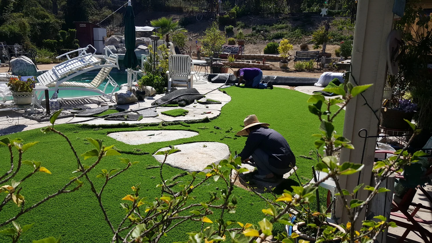 Artificial Grass Is A Good Choice Whether Rain Or Shine Quality Home Improvement.jpg