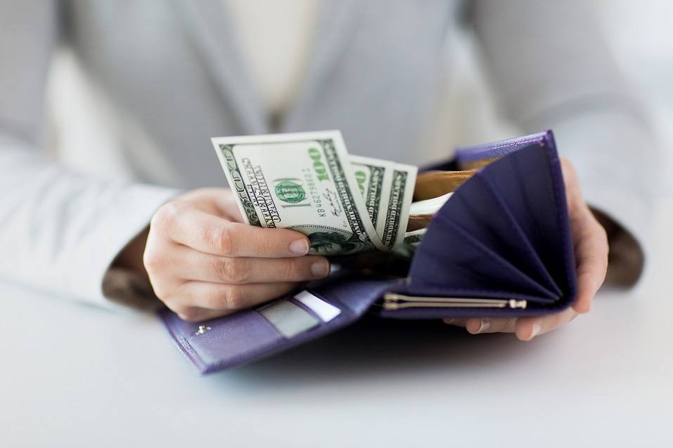 close-up-of-woman-hands-with-wallet-and-money.jpg