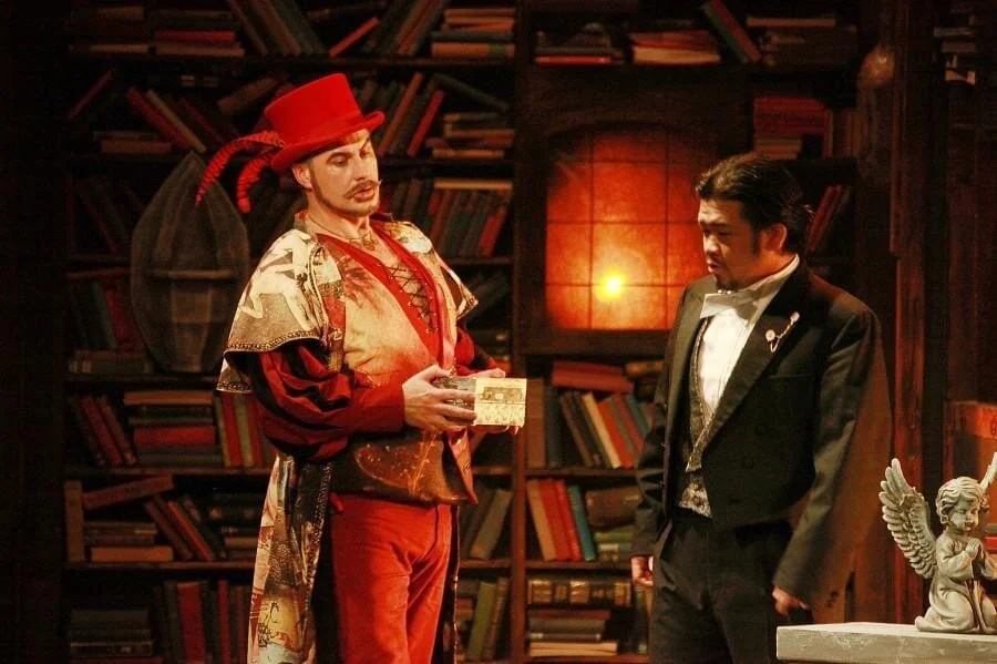 Mephistopheles and Faust by Lisa Zagone